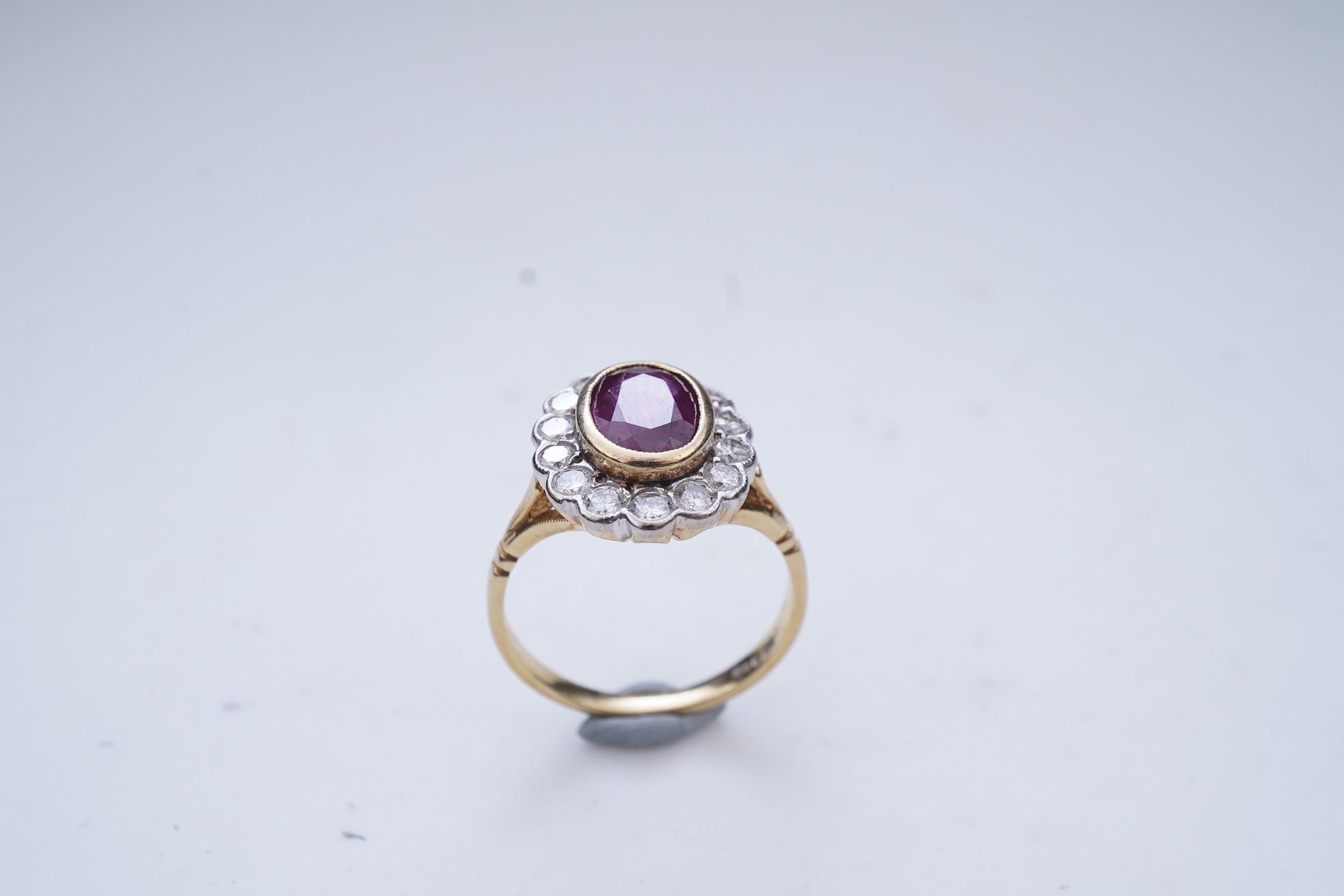 A ruby and diamond cluster ring
